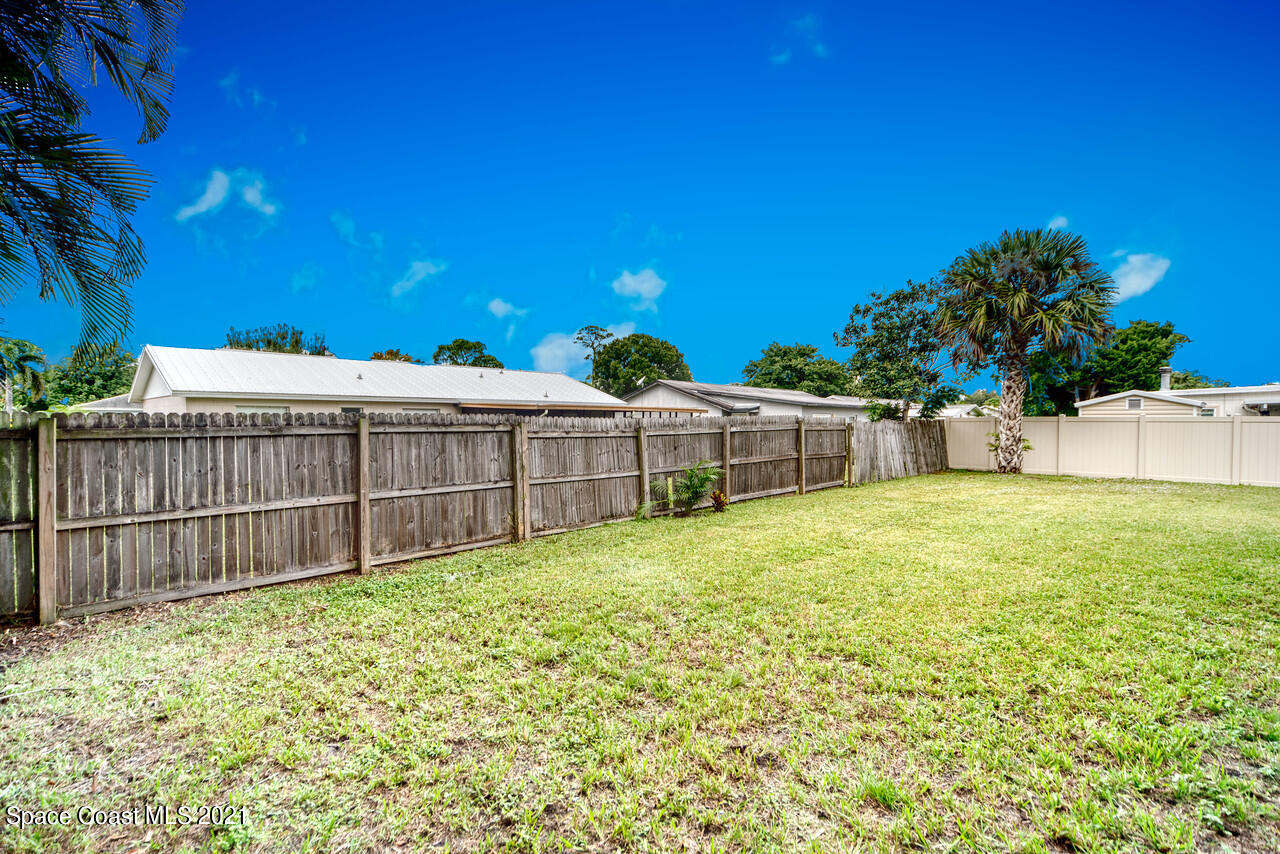 553 Edward Road West Melbourne, FL 32904 - Photo 25 of 26 a view of a backyard