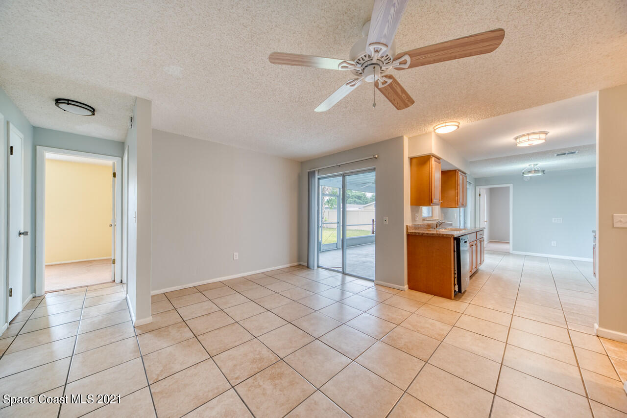 553 Edward Road West Melbourne, FL 32904 - Photo 4 of 26 a view of an empty room with a window