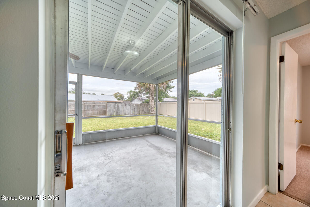 553 Edward Road West Melbourne, FL 32904 - Photo 5 of 26 a view of an empty room and window