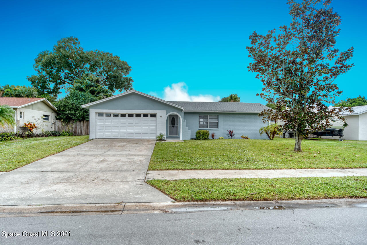 553 Edward Road West Melbourne, FL 32904 - Photo 9 of 26 a sign board with a house in the background