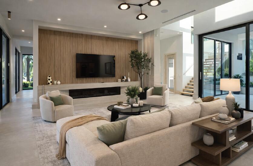 299 Northeast 7th Street Boca Raton, FL 33432 - Photo 110 of 112 a living room with furniture and a flat screen tv