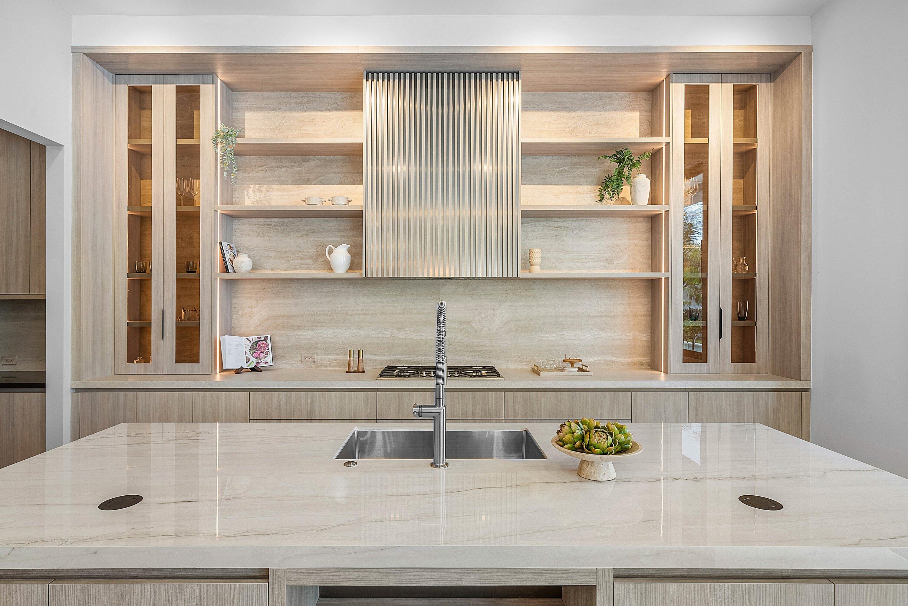 299 Northeast 7th Street Boca Raton, FL 33432 - Photo 14 of 112 a kitchen sink with white cabinets and a window