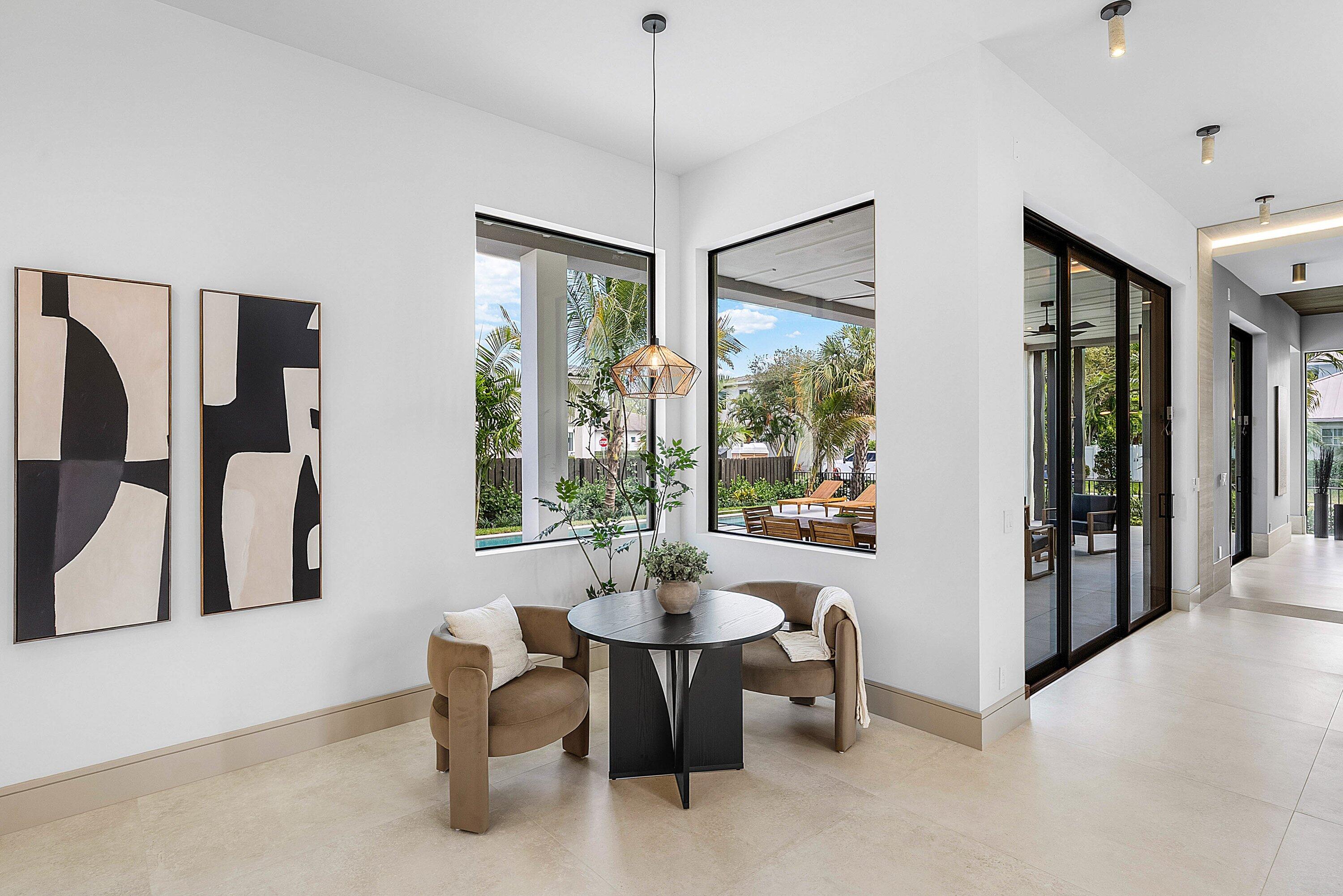 299 Northeast 7th Street Boca Raton, FL 33432 - Photo 19 of 112 a dining room with furniture and window