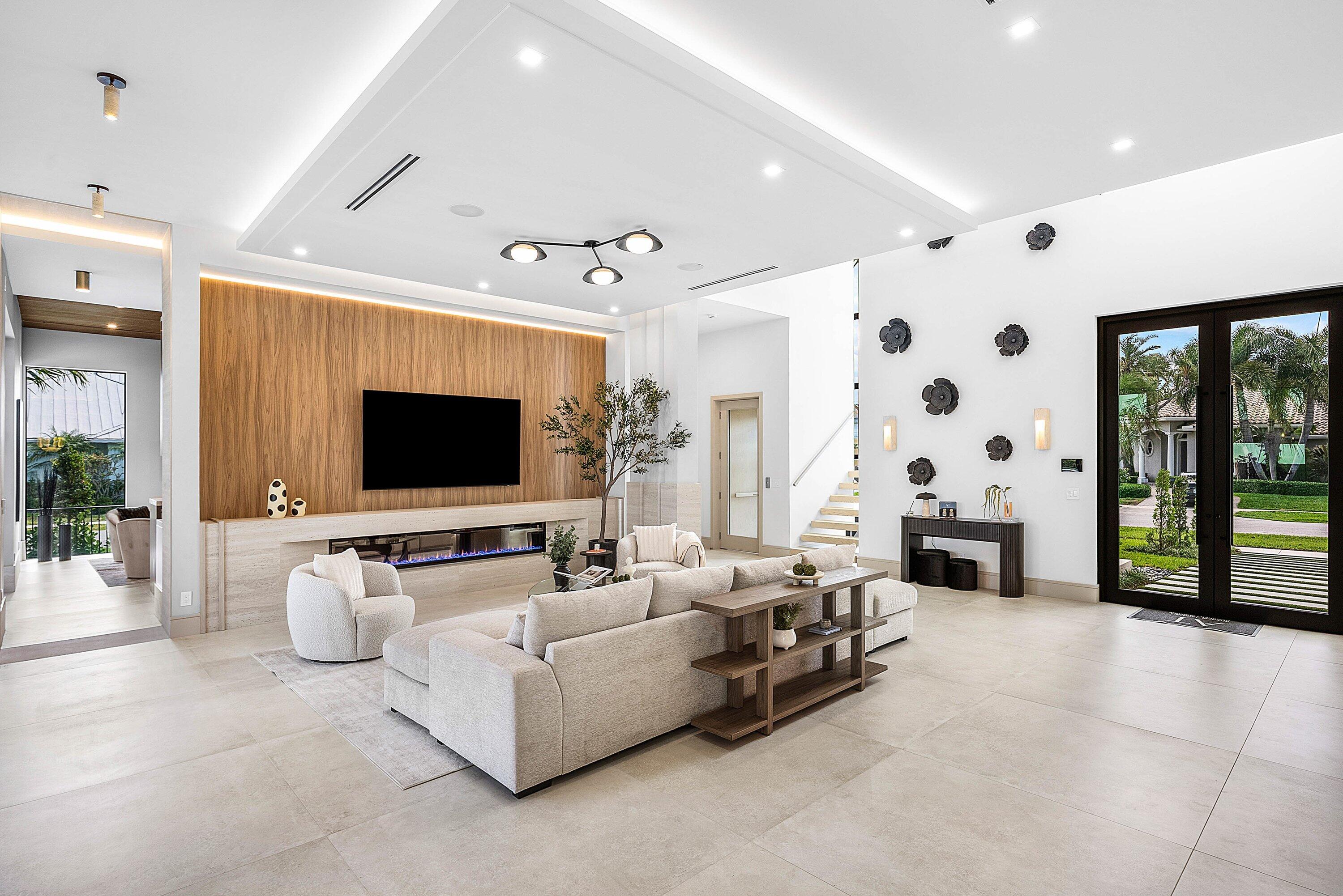 299 Northeast 7th Street Boca Raton, FL 33432 - Photo 22 of 112 a living room with furniture and a flat screen tv