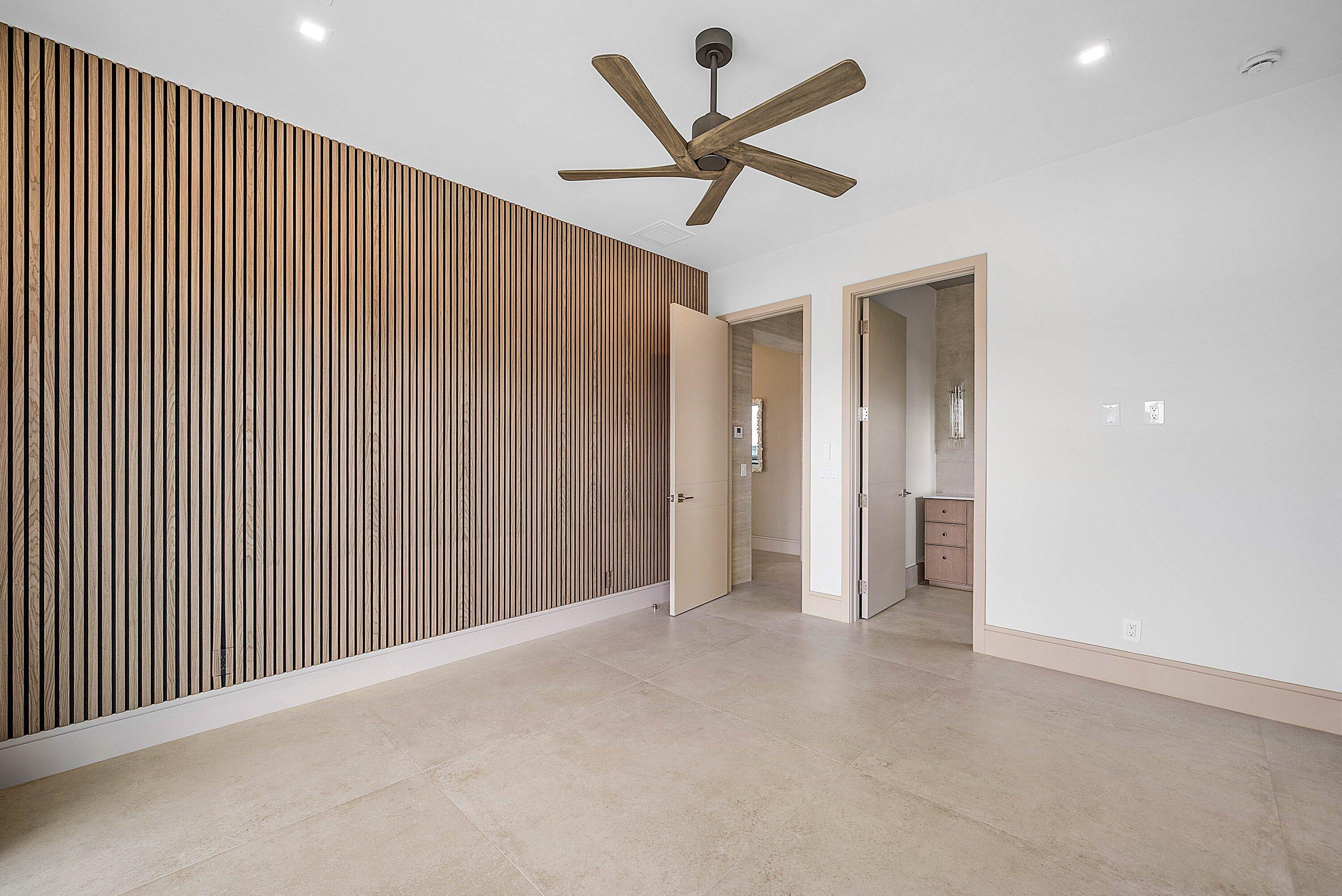 299 Northeast 7th Street Boca Raton, FL 33432 - Photo 38 of 112 a view of an empty room with a ceiling fan