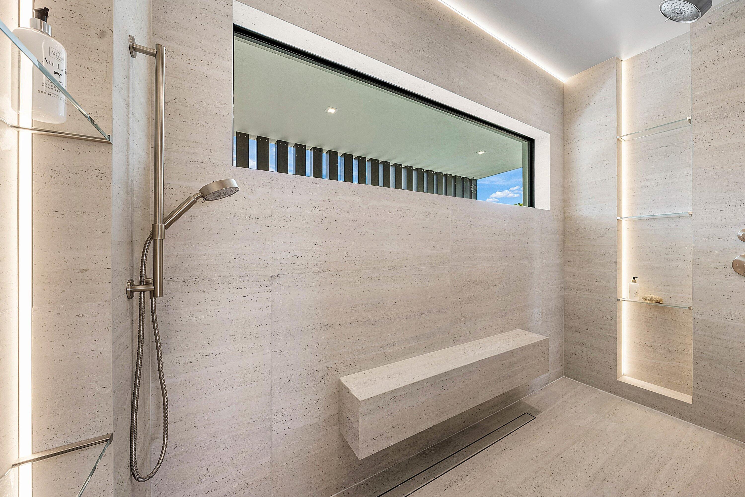 299 Northeast 7th Street Boca Raton, FL 33432 - Photo 57 of 112 a bathroom with a shower and a glass door