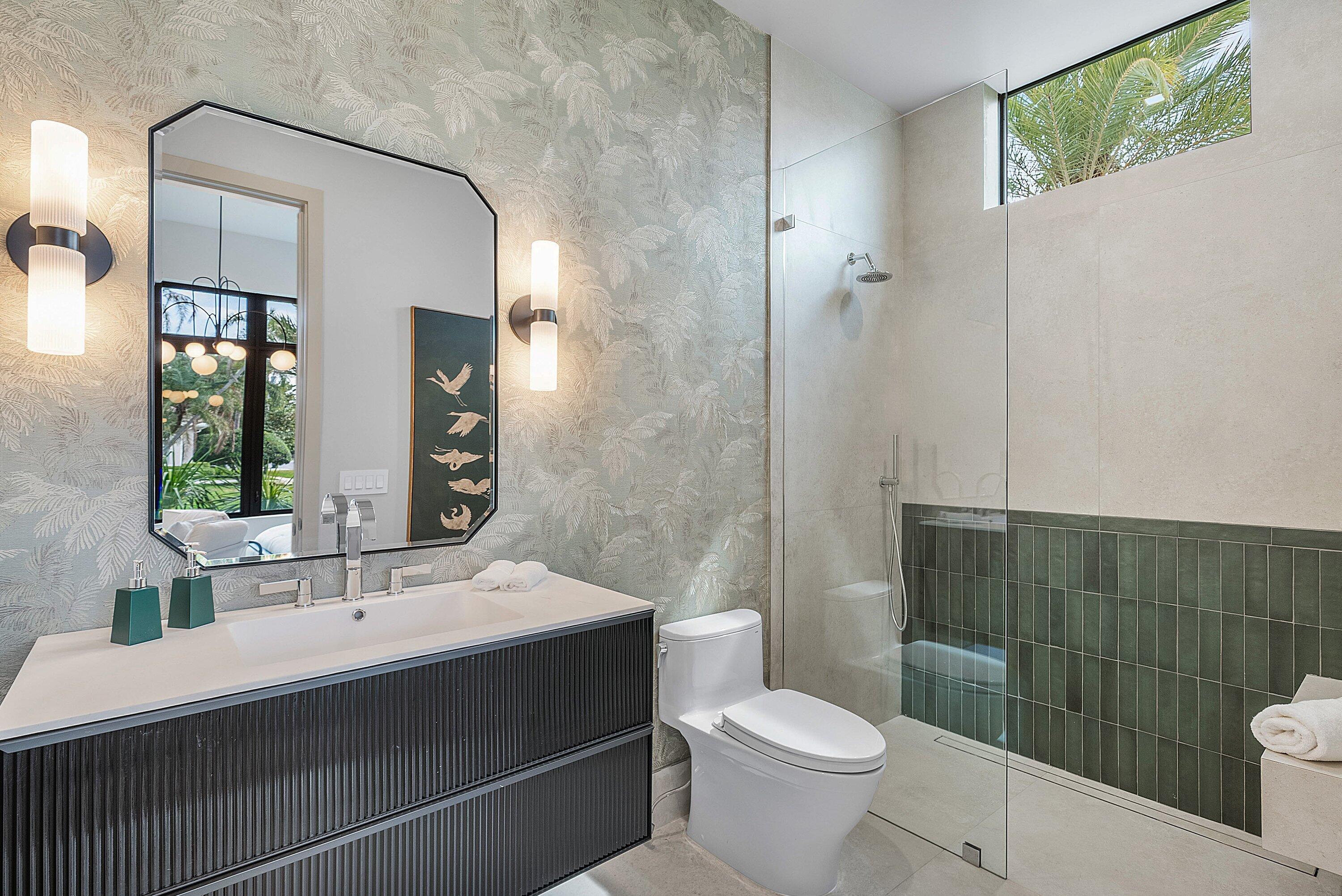 299 Northeast 7th Street Boca Raton, FL 33432 - Photo 60 of 112 a bathroom with a sink a toilet and shower