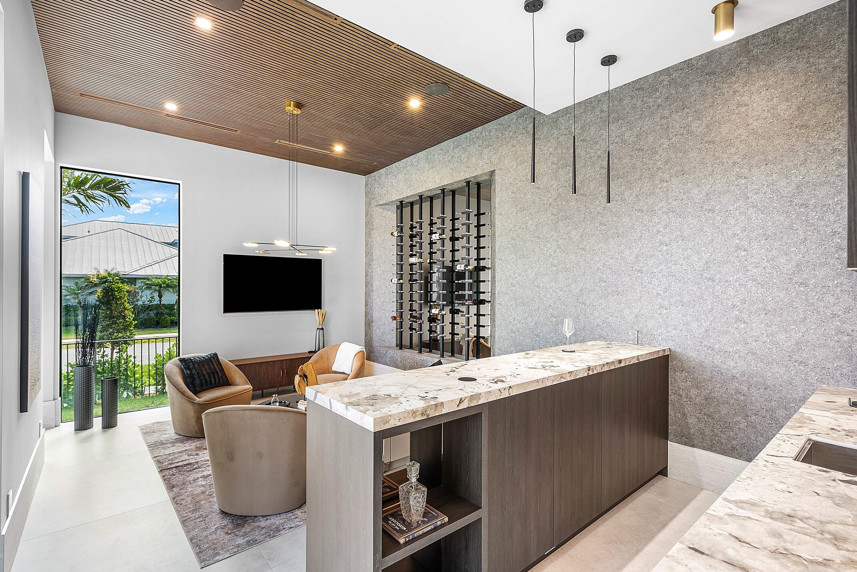 299 Northeast 7th Street Boca Raton, FL 33432 - Photo 6 of 112 a living room with stainless steel appliances kitchen island granite countertop a sink and a flat screen tv