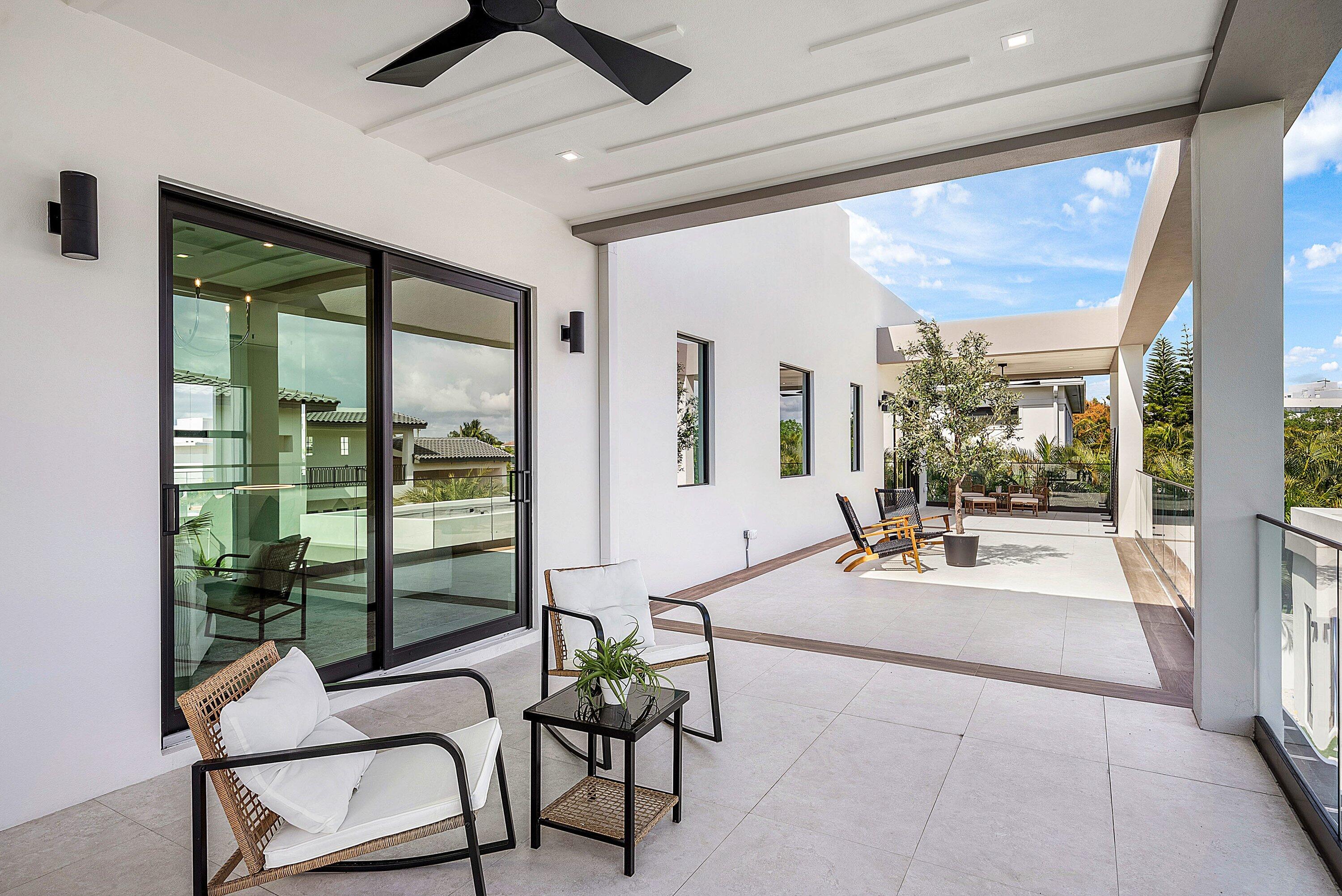 299 Northeast 7th Street Boca Raton, FL 33432 - Photo 67 of 112 a living room with furniture and a large window
