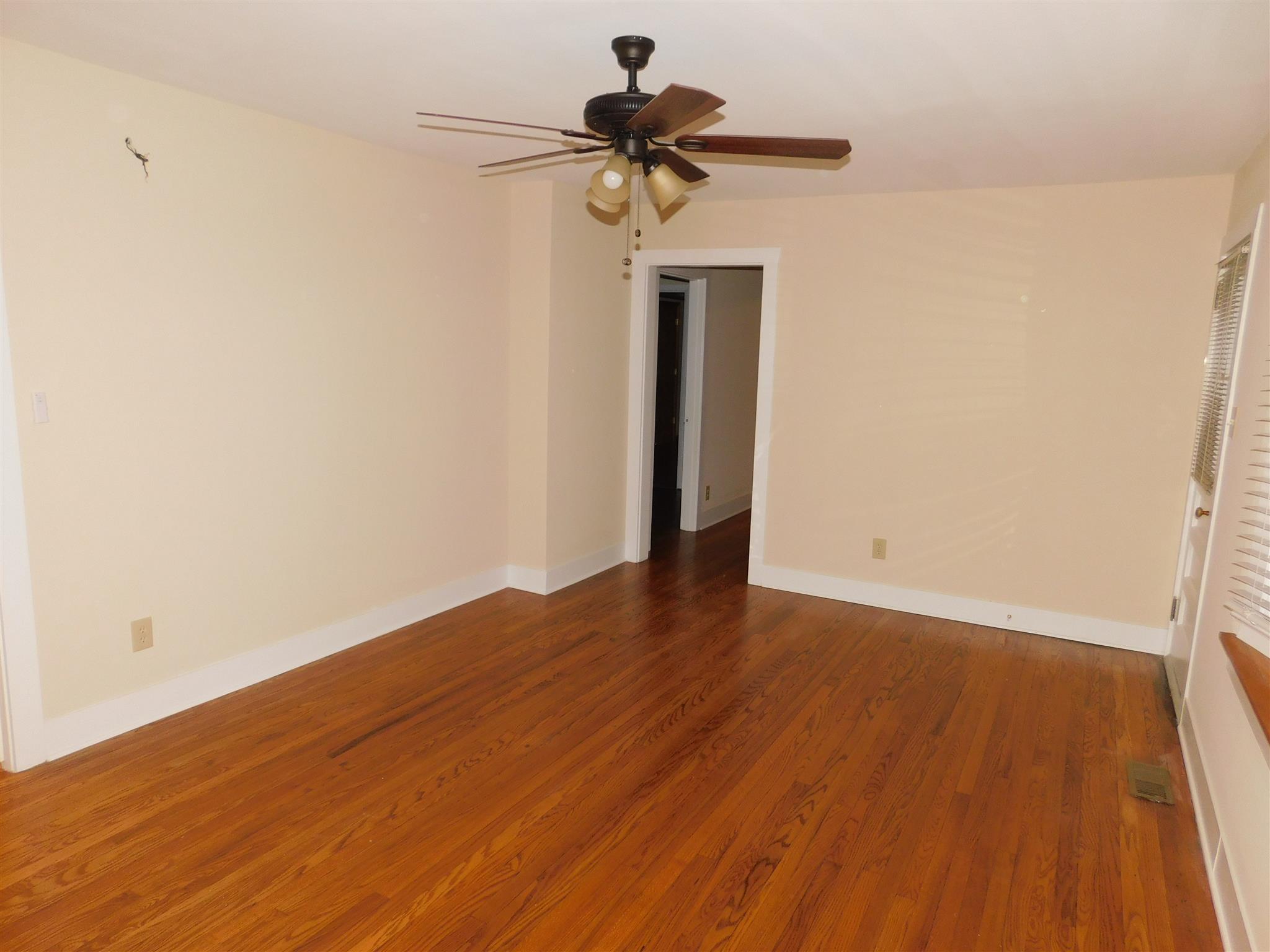 206 Ragan Street Tullahoma, TN 37388 - Photo 12 of 24 Living room has refinished hardwood floors, new sheetrock and fresh paint.
