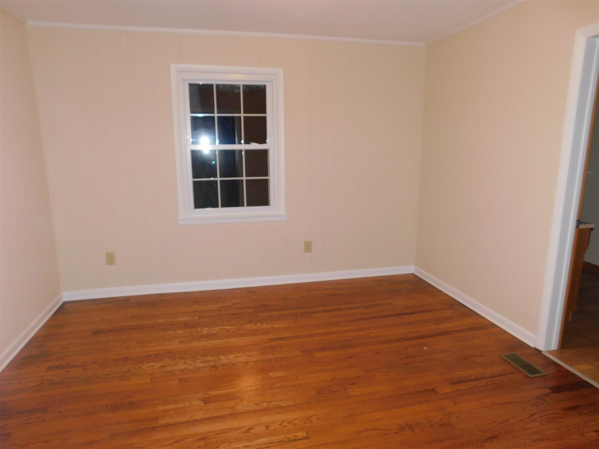 206 Ragan Street Tullahoma, TN 37388 - Photo 14 of 24 Master bedroom has refinished hardwood floors and master bath.