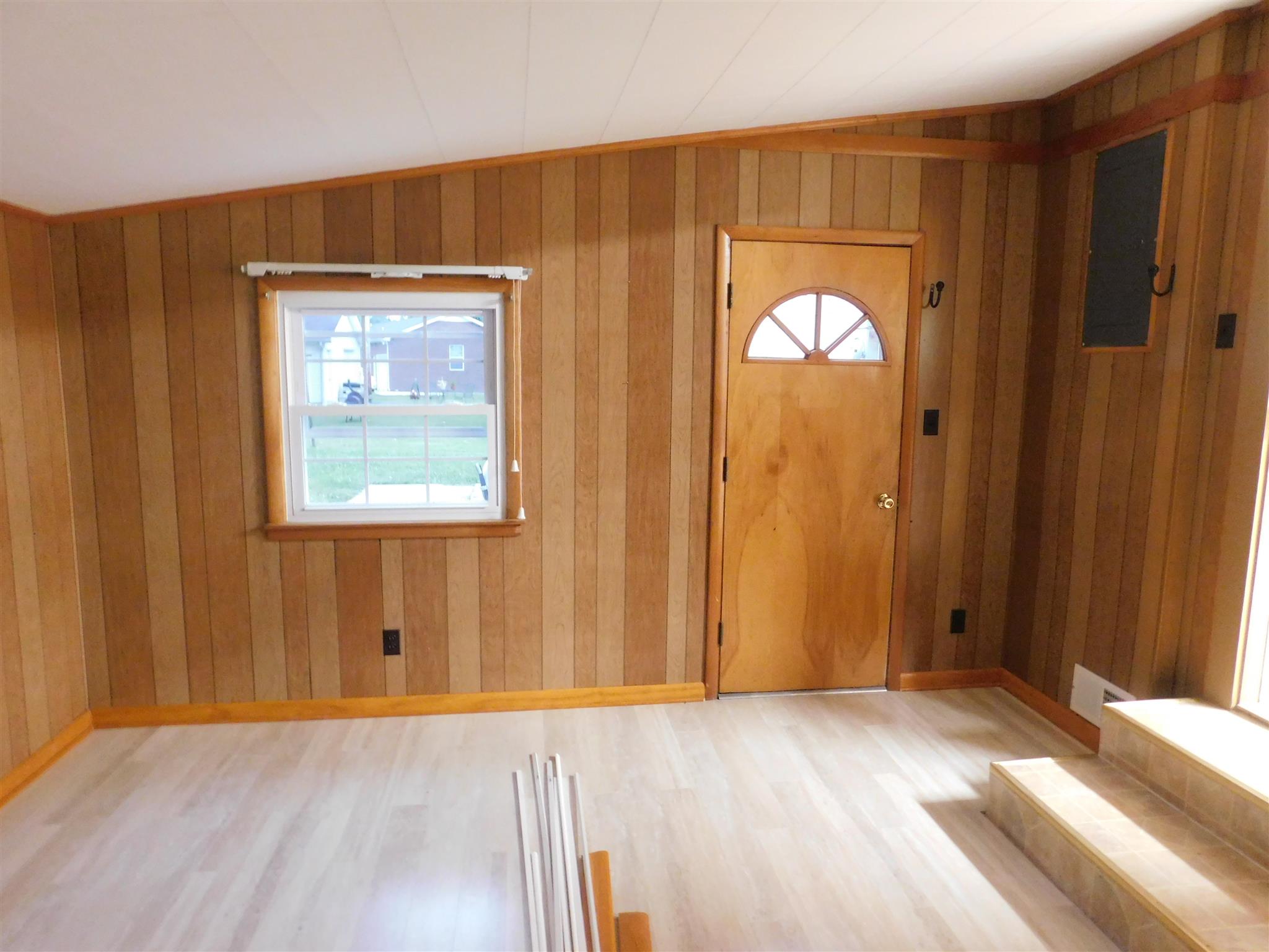 206 Ragan Street Tullahoma, TN 37388 - Photo 24 of 24 This room has new flooring and can be 3rd bedroom, with two large closets. Has its own outside entry.