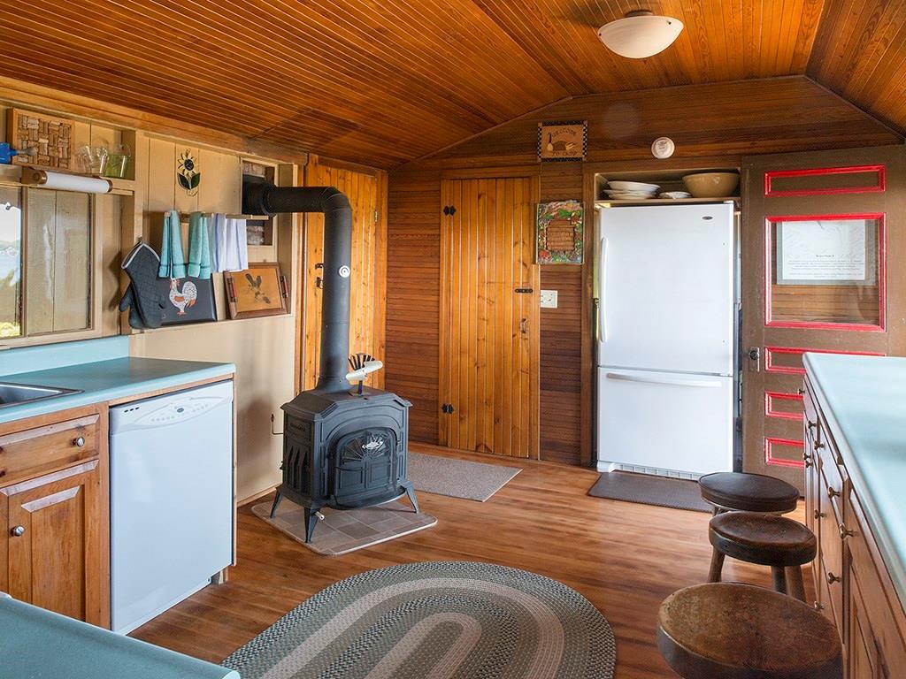 120 Marsh Lane Rome, ME 04963 - Photo 11 of 35 Kitchen with a cozy woodstove to...
