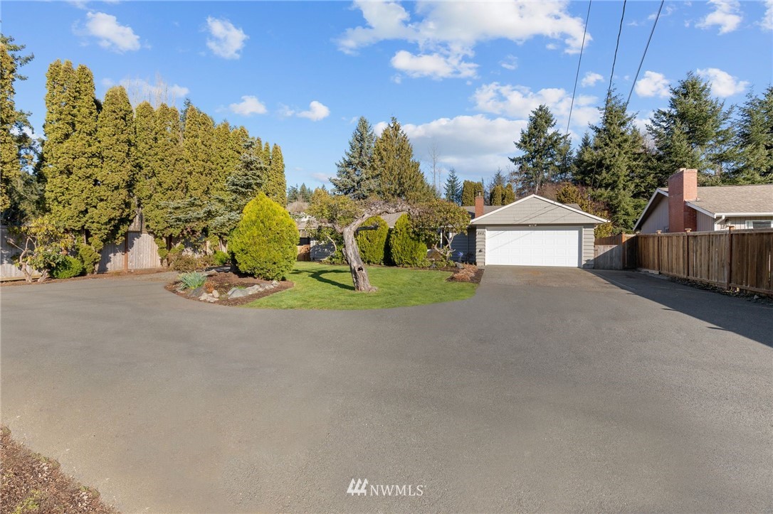 645 240th Street Southeast Bothell, WA 98021 - Photo 1 of 25 a view of a street with houses
