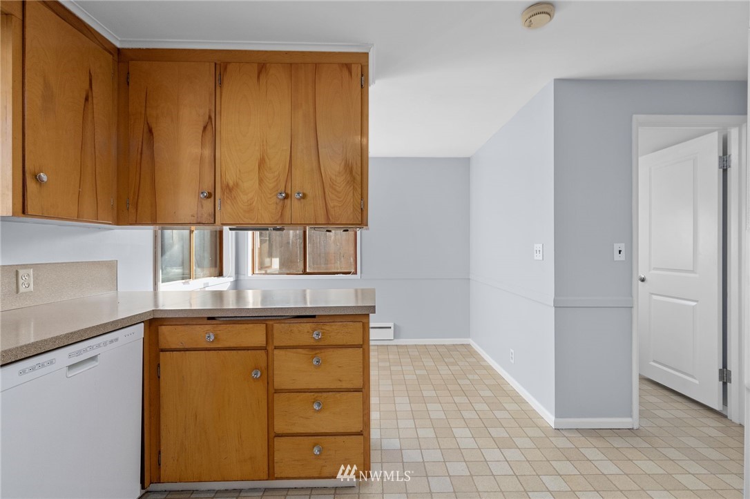 645 240th Street Southeast Bothell, WA 98021 - Photo 11 of 25 a view of cabinets and utility room