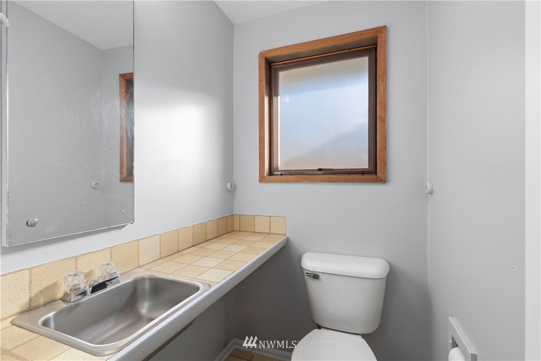 645 240th Street Southeast Bothell, WA 98021 - Photo 12 of 25 a bathroom with a sink and a toilet