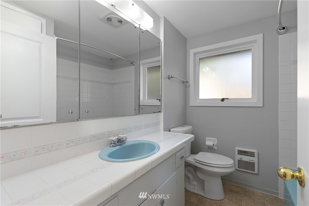 645 240th Street Southeast Bothell, WA 98021 - Photo 14 of 25 a bathroom with a sink and a toilet