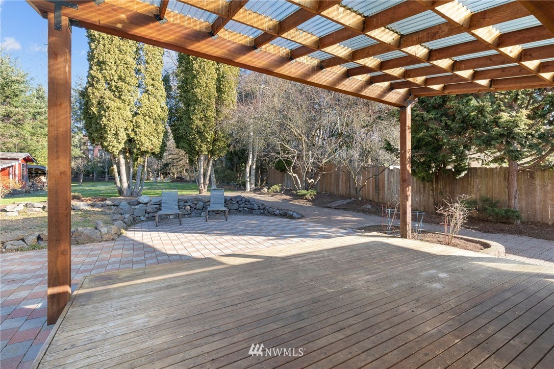 645 240th Street Southeast Bothell, WA 98021 - Photo 18 of 25 a backyard of a house with lots of green space