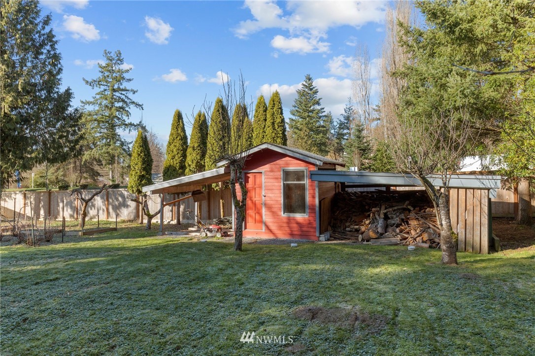 645 240th Street Southeast Bothell, WA 98021 - Photo 24 of 25 a view of a house with a yard