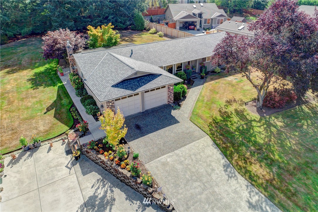 14221 Seattle Hill Road Snohomish, WA 98296 - Photo 4 of 38 an aerial view of a house with a yard and garden