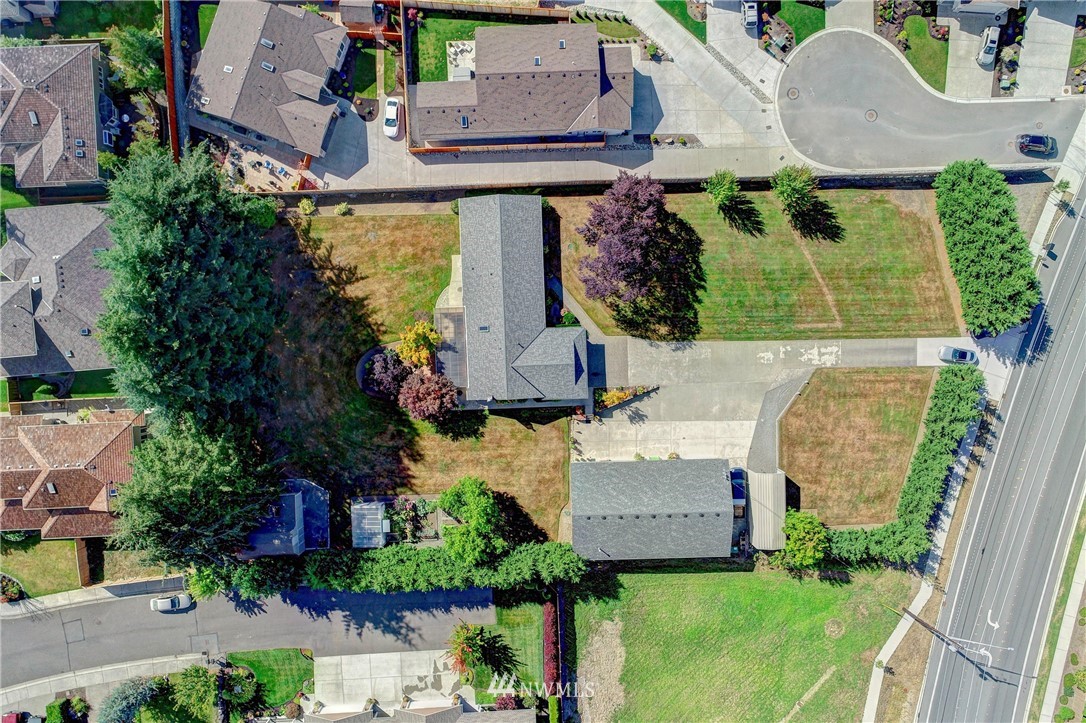 14221 Seattle Hill Road Snohomish, WA 98296 - Photo 34 of 38 an aerial view of a house with garden space and street view