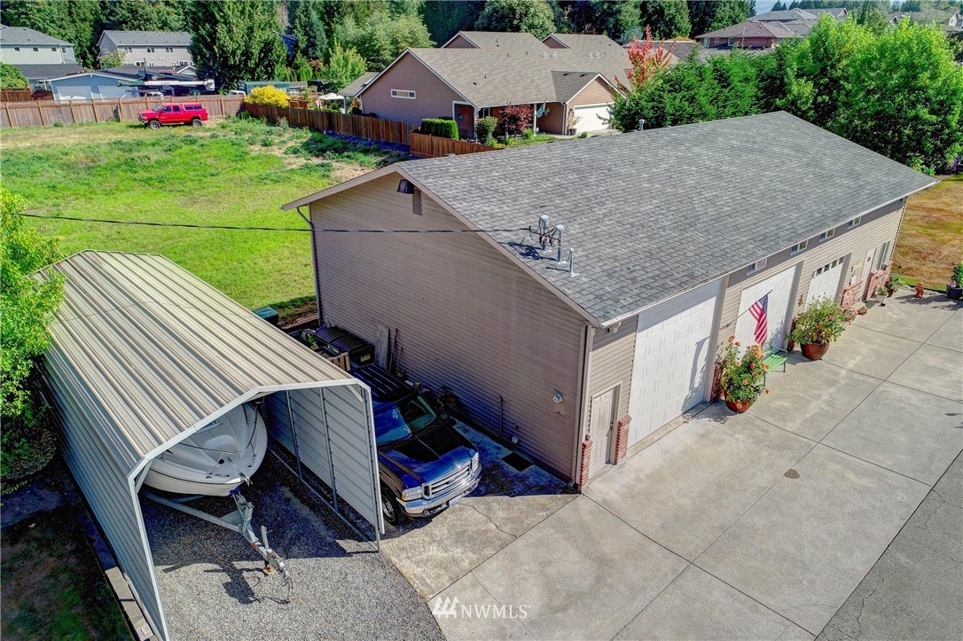 14221 Seattle Hill Road Snohomish, WA 98296 - Photo 5 of 38 an aerial view of a house roof deck and garden