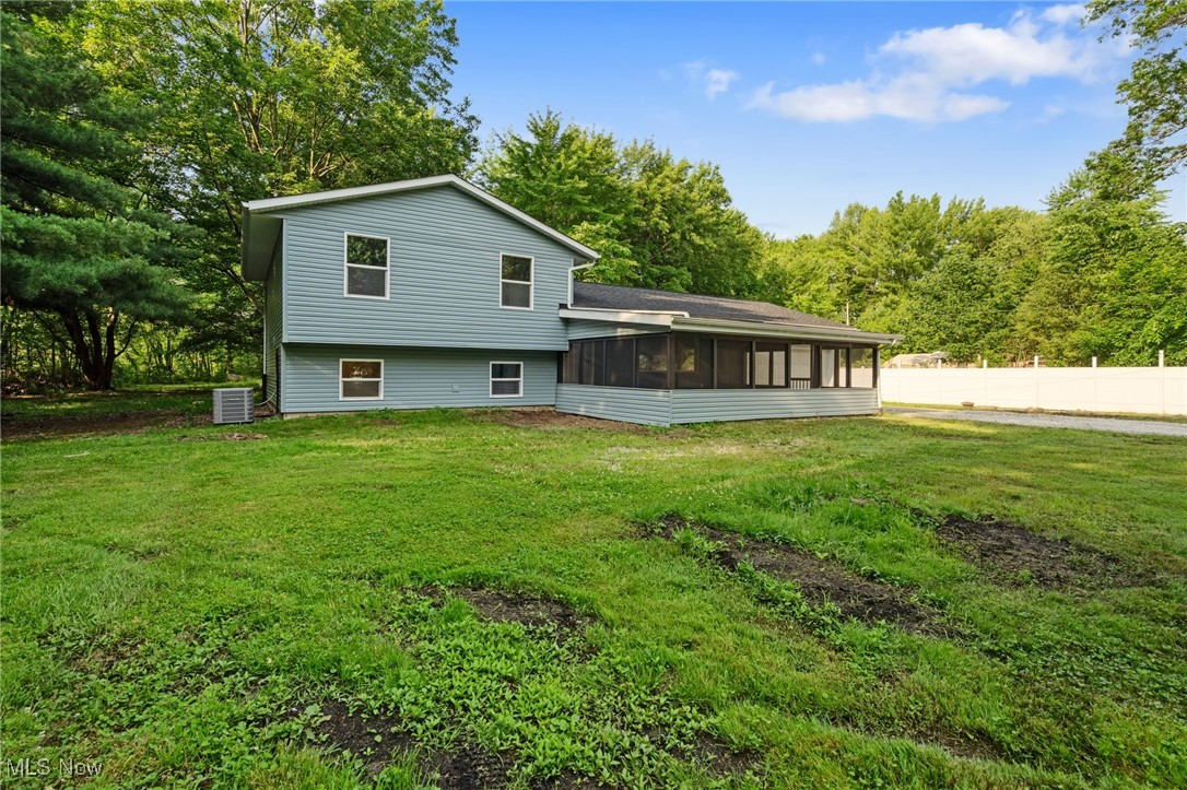 4232 Wilson Avenue Ravenna, OH 44266 - Photo 1 of 28 Back of property featuring a sunroom