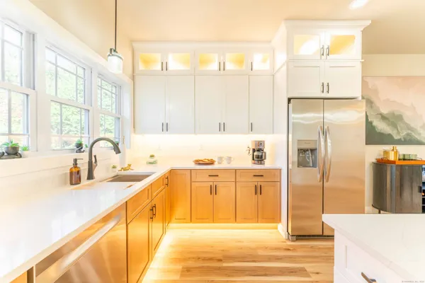a view of a kitchen with a window