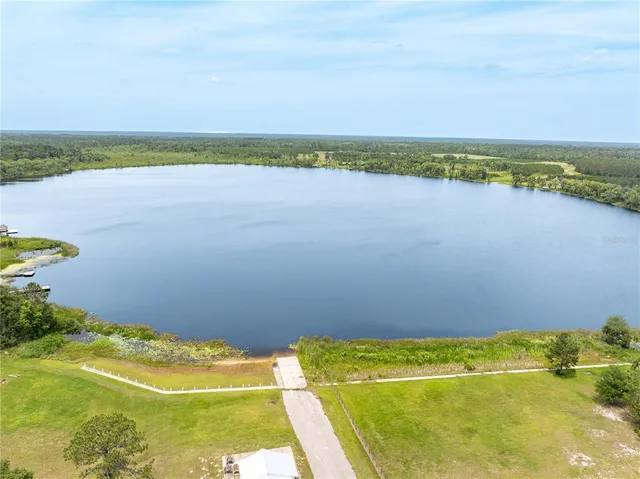 a view of an swimming pool and an outdoor seating