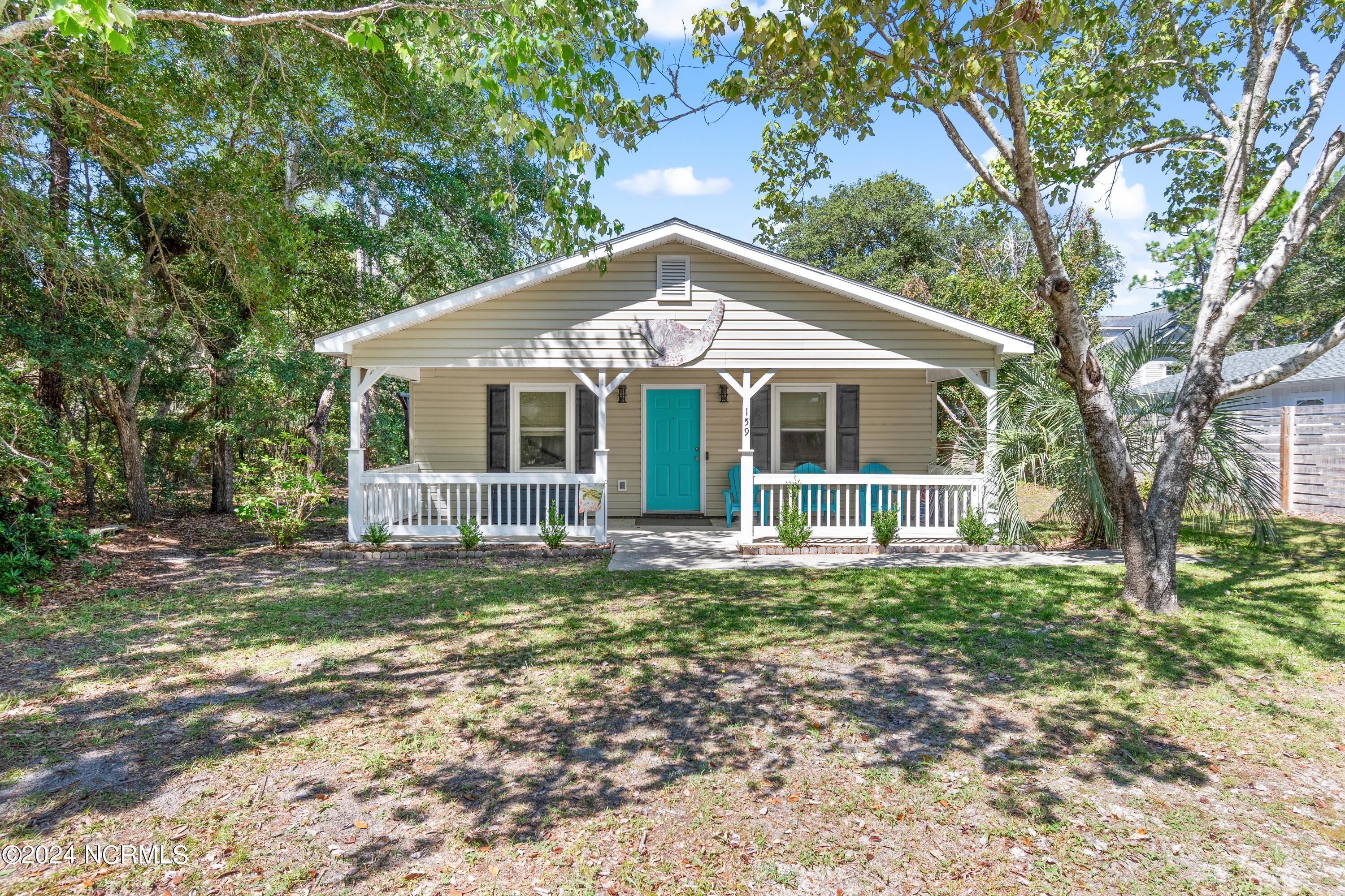 159 Northwest 3rd Street Oak Island, NC 28465 - Photo 1 of 65 159NWThirdSt - 1