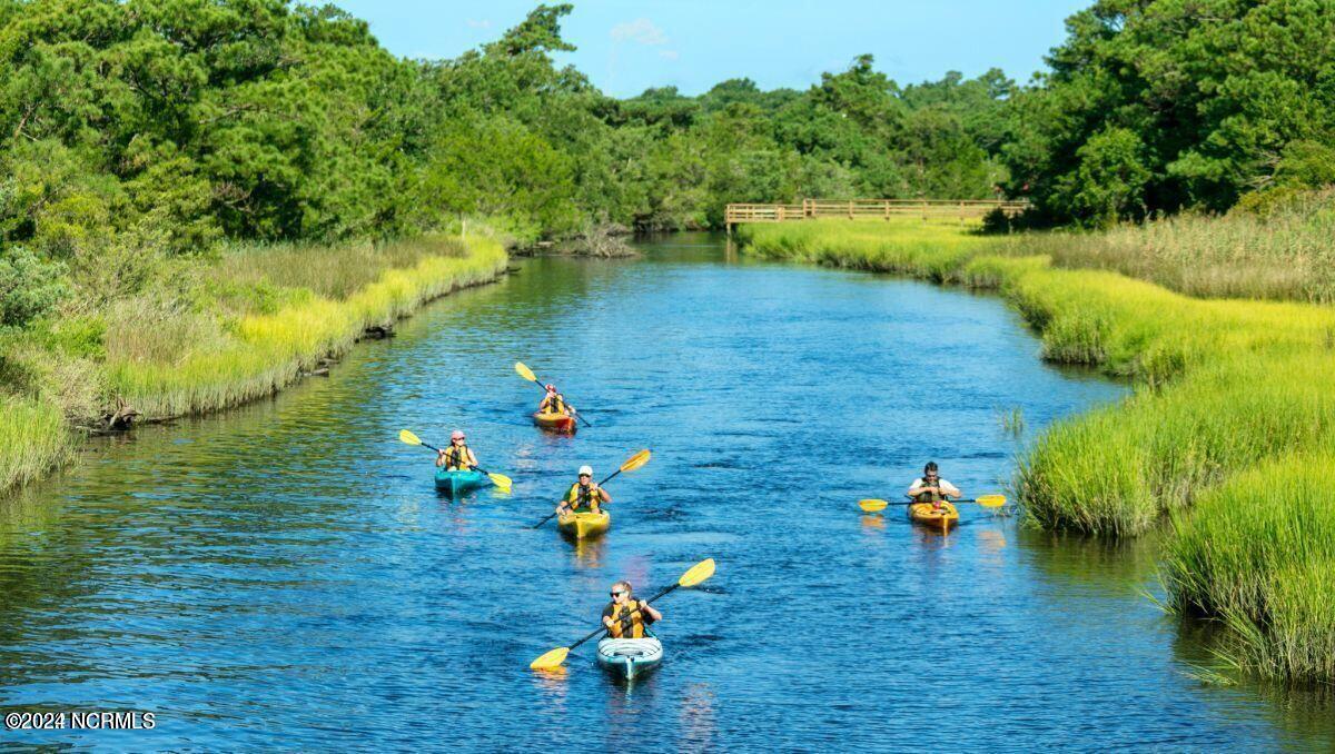 159 Northwest 3rd Street Oak Island, NC 28465 - Photo 60 of 65 Kayakers in OKI (2)