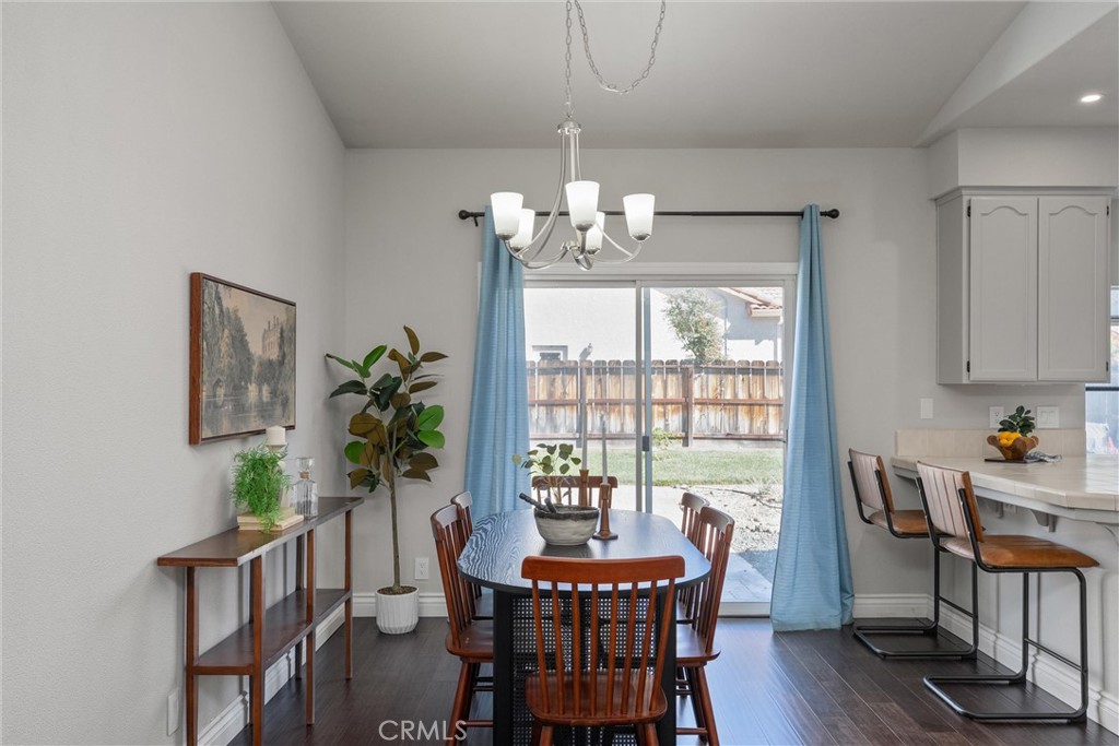 1921 Ascolano Way Chico, CA 95928 - Photo 14 of 42 a view of a dining room with furniture window and wooden floor