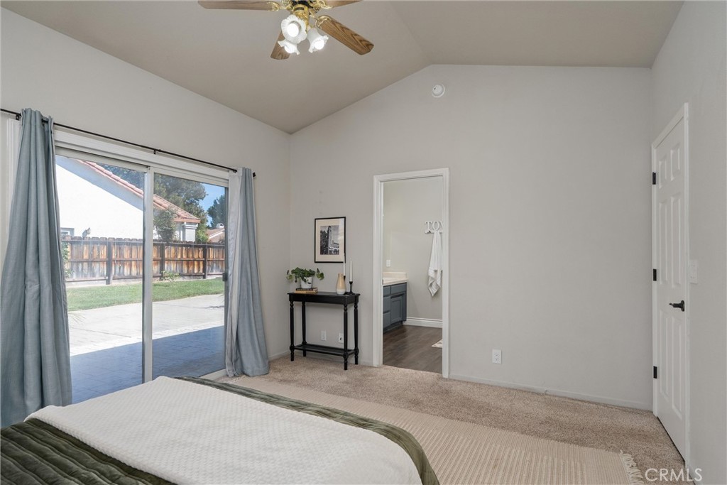 1921 Ascolano Way Chico, CA 95928 - Photo 23 of 42 a bedroom with a bed and a large window