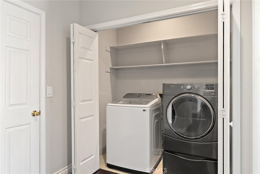 1921 Ascolano Way Chico, CA 95928 - Photo 25 of 42 a utility room with dryer and washer