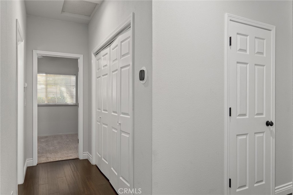 1921 Ascolano Way Chico, CA 95928 - Photo 30 of 42 a view of a hallway with wooden floor