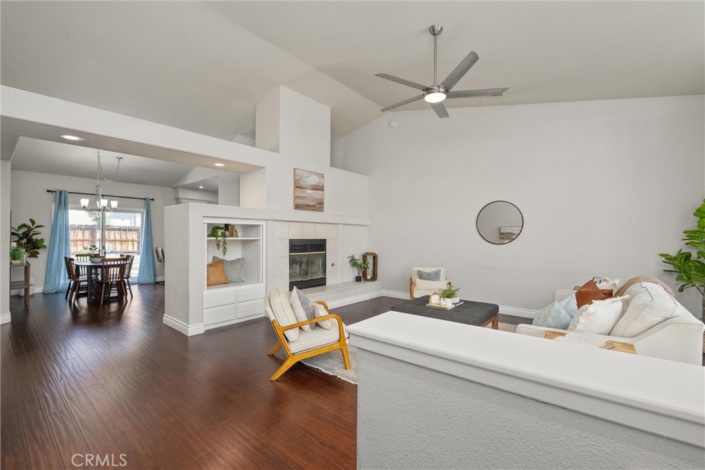 1921 Ascolano Way Chico, CA 95928 - Photo 7 of 42 a living room with furniture and a dining table with wooden floor