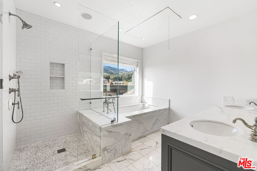0 Broad Beach Road Malibu, CA 90265 - Photo 42 of 54 a bathroom with a sink and a shower