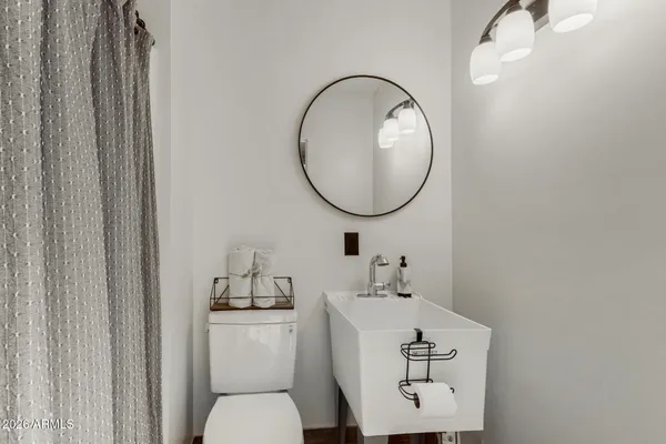 a view of house with outdoor space and swimming pool