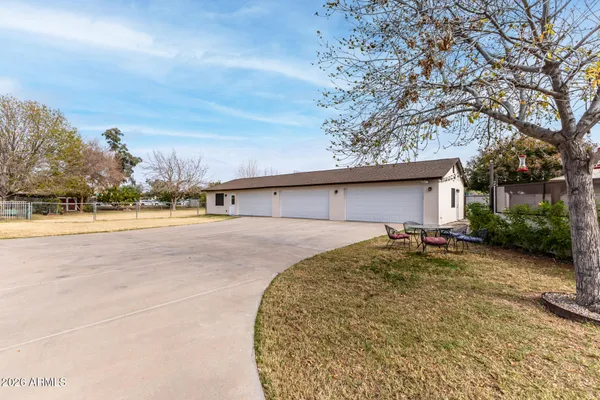 a view of a yard with a slide