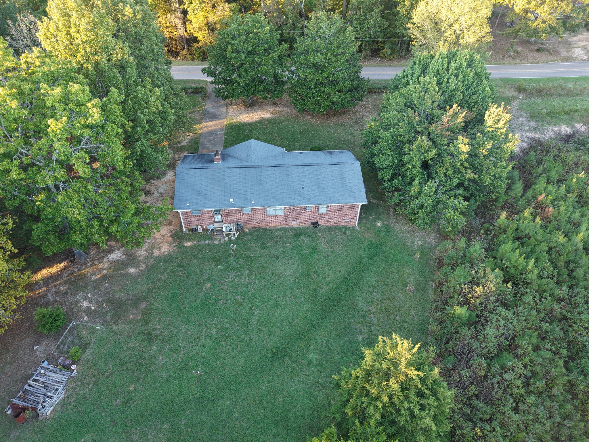 3190 Plainview Road Henderson, TN 38340 - Photo 3 of 6 a view of a house with a yard