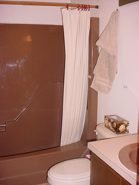1044 Canterbury Road Bushkill, PA 18324 - Photo 4 of 8 a bathroom with a toilet and a sink