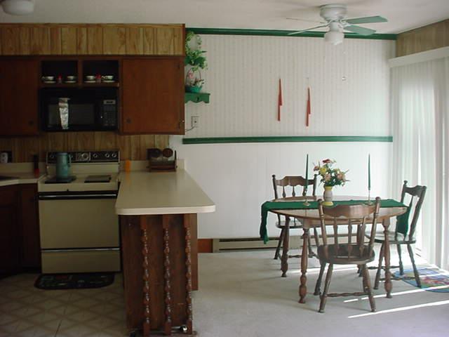 1044 Canterbury Road Bushkill, PA 18324 - Photo 6 of 8 a dining room with furniture and window