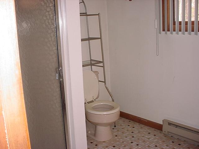 1044 Canterbury Road Bushkill, PA 18324 - Photo 8 of 8 a bathroom with a toilet and a shower
