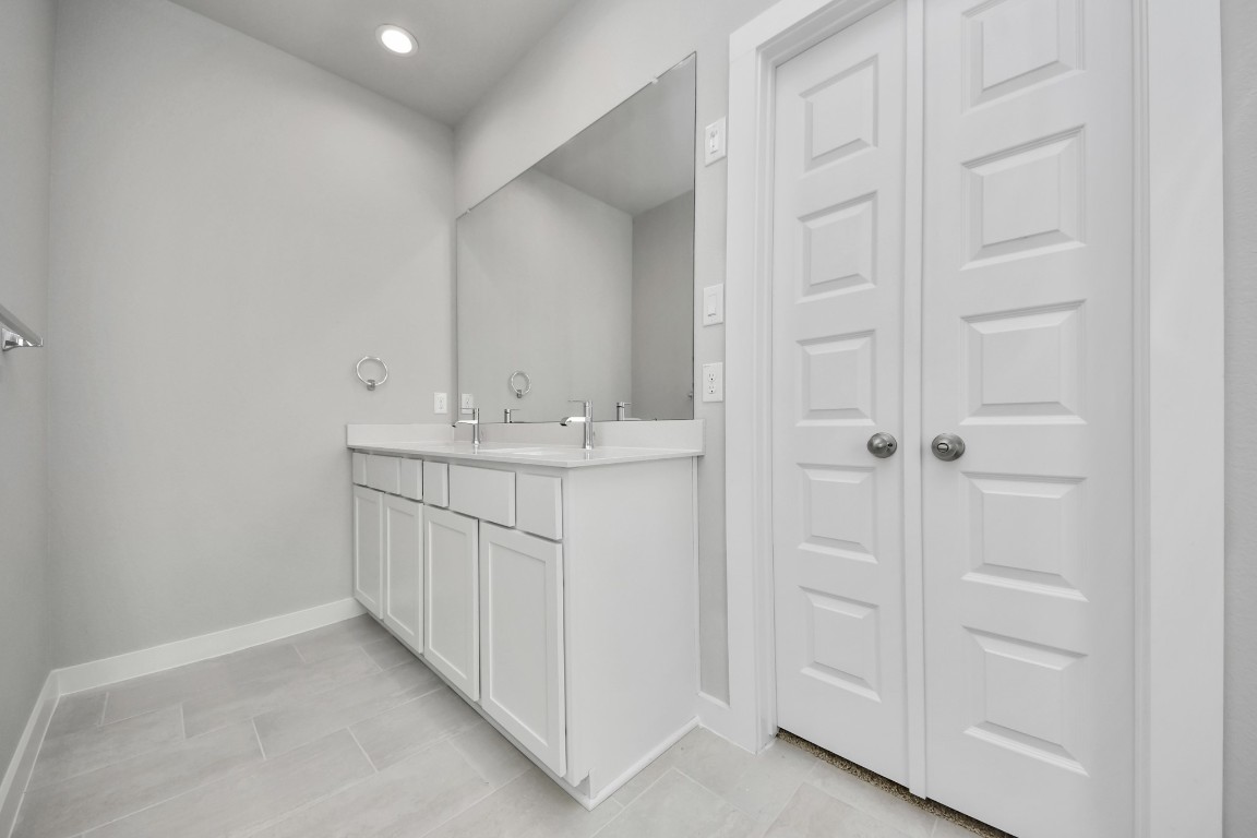 15707 Telge Ridge Lane Cypress, TX 77429 - Photo 31 of 38 a bathroom with a sink