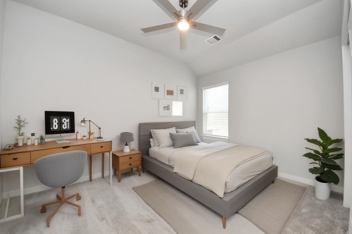 15707 Telge Ridge Lane Cypress, TX 77429 - Photo 36 of 38 a bedroom with a bed furniture and a potted plant