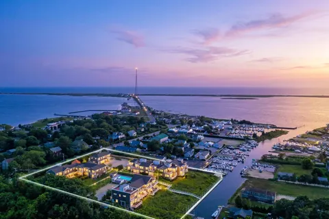 a view of a swimming pool with a garden and plants