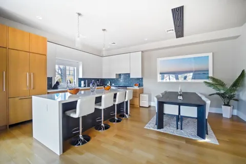 a workspace with furniture and a window