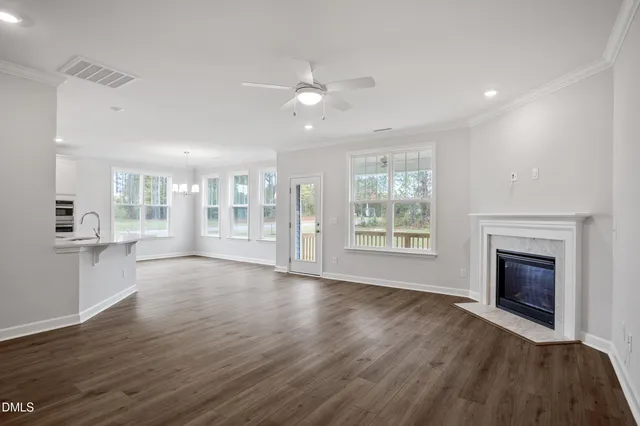 a bathroom with a shower sink and mirror