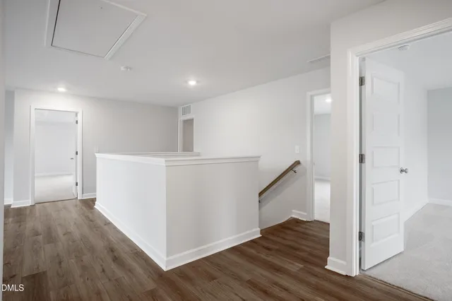 a view of a storage & utility room with racks on the wall