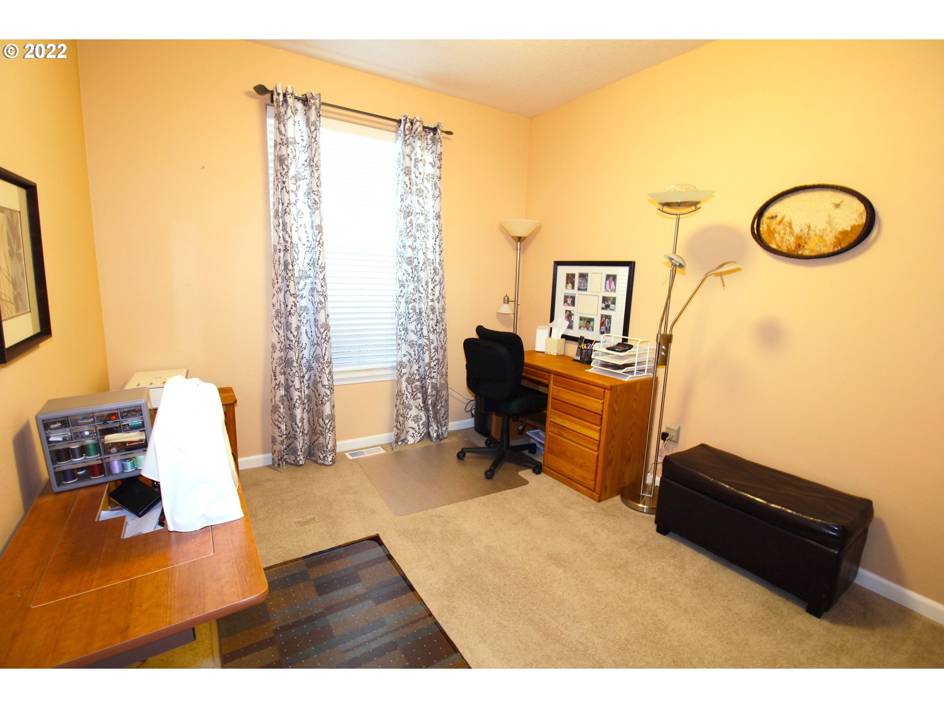 4520 Southwest 11th Street Gresham, OR 97080 - Photo 17 of 30 a living room with furniture and a window